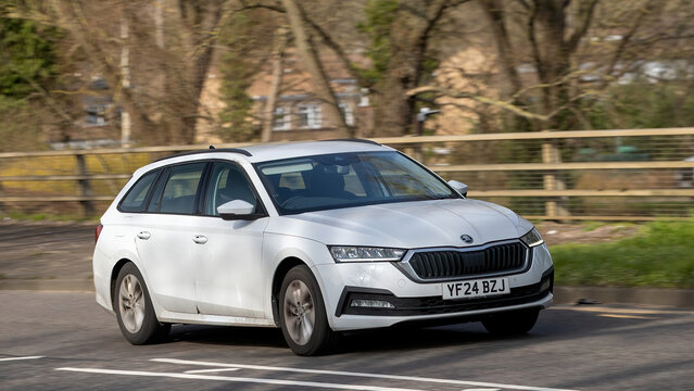Milton Keynes,Bucks,UK - Mar 5th 2026:  2024 white Skoda Octavia station wagon car driving on a British road