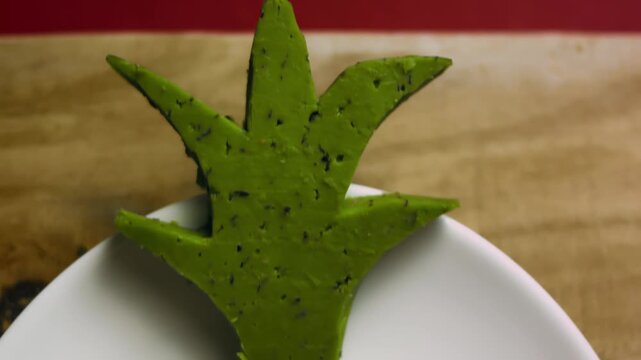 Plated Lady s Caprice salad creatively shaped like a pineapple