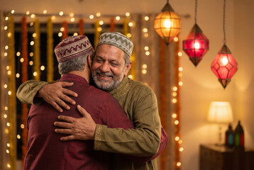 Obraz premium Two Muslim men warmly embracing each other in celebration, shari