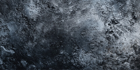 Dark blue and black and white abstract background featuring a rough grunge texture of old stone and cold winter ice on a weathered concrete wall surface © BIBI