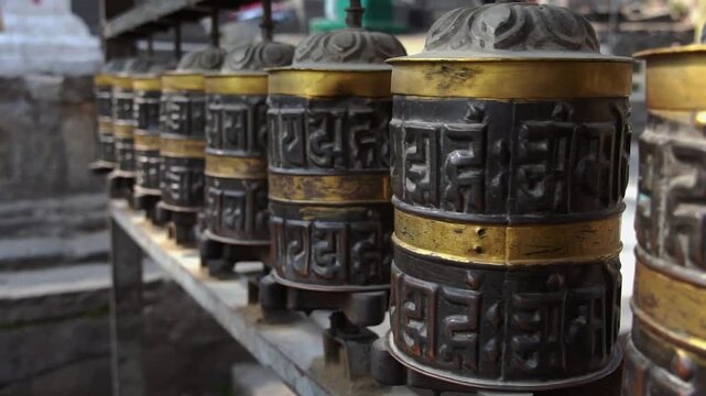 Row of Traditional Buddhist Prayer Wheels