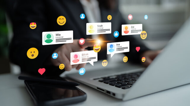 A professional person engages with a laptop while floating social media icons and user comments surround the device, illustrating modern digital communication and interaction. Ledger