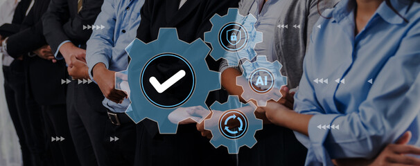 A group of business professionals stands together, showcasing teamwork and technology through digital icons and gears that represent efficiency and innovation in the workplace. Gantry © InfiniteFlow