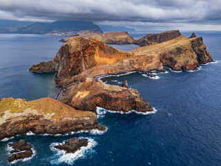 Rocky volcanic cliffs overlooking the Atlantic Ocean along the exposed coastline of Sao Lourenco, Madeira Island © Leonid