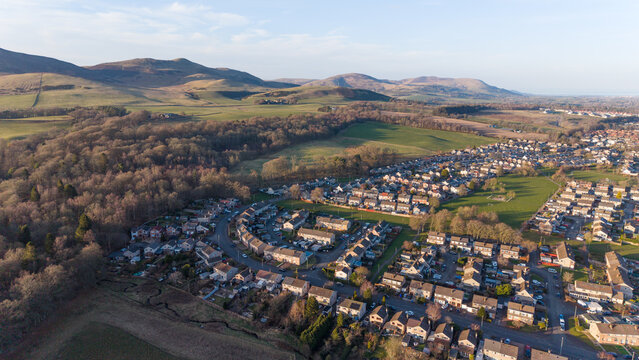 Panoramic aerial view of Penicuik and the Pentland Hills: A vast Scottish landscape featuring Carnethy Hill and the rural countryside of Midlothian.