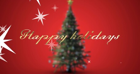 Featuring evergreen tree with ornaments, lights on red backdrop, showing gold Happy holidays