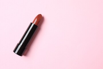 Lipstick isolated on pink background