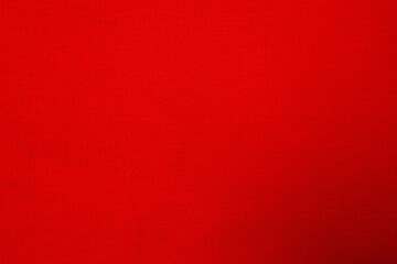 Red fabric background, top view © Sunlight