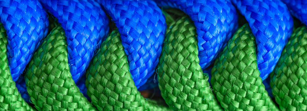 Close-up of a rope tied in a snake knot, decorative knots and braids, macro photography, nylon string