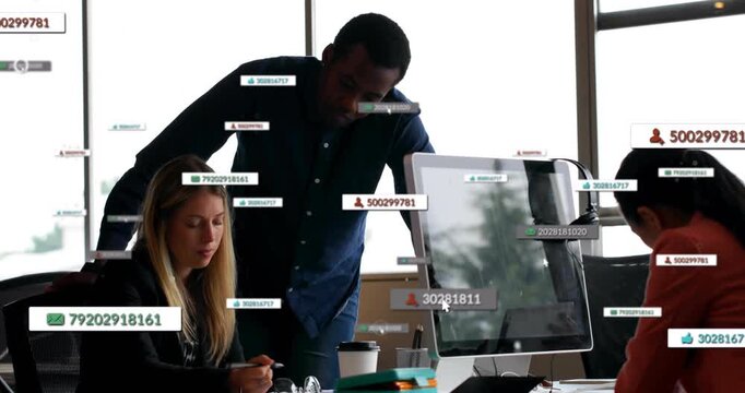 Alerts appearing, three teammates leaning over monitor, writing and typing to finish report