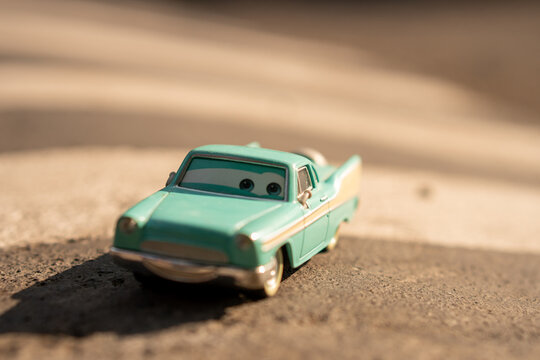 Temanggung, Indonesia, September 8, 2023 : Die-cast model of the character Derek "Decals" Dobbs from the Disney Pixar Cars franchise. This model was released as part of the "Final Lap" collection.