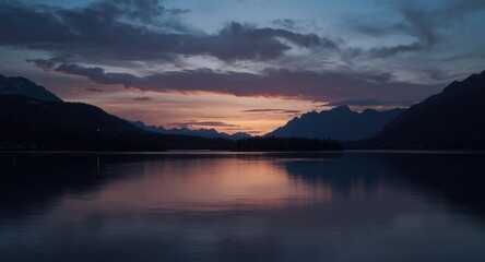 Cinematic matte landscape of lake scene with shadowed mountains at sunset