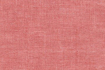 Fototapeta premium texture of a light red canvas fabric with soft, natural hues and subtle grain patterns. illustration for fashion or home decor materials