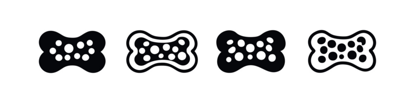 Set of abstract rectangular shapes with dotted patterns, resembling sponges or textured surfaces, on white.