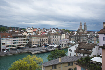 Fototapeta premium Panoramic view of Zurich old town and Limmat River with Grossmunster church towers