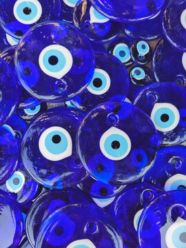 Background of many blue Turkish evil eye amulets Nazar Boncuk