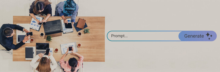 A diverse team collaborates at a wooden table, engaged in technology use and discussion, showcasing...