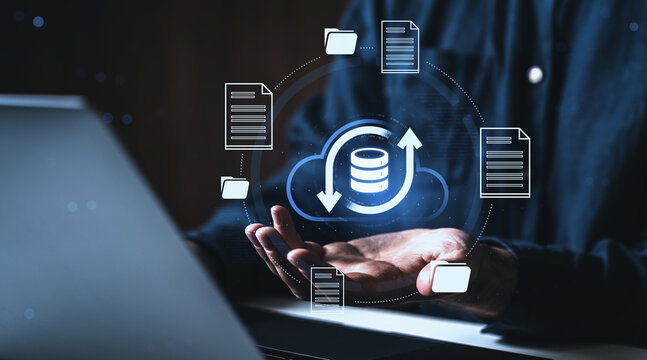 Cloud data backup and file synchronization interface above hands in futuristic digital technology modern innovation style.