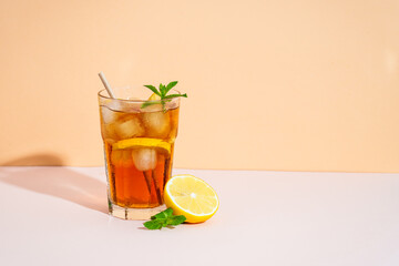 Fototapeta premium Summer cold drink on colored background with hard shadows.
