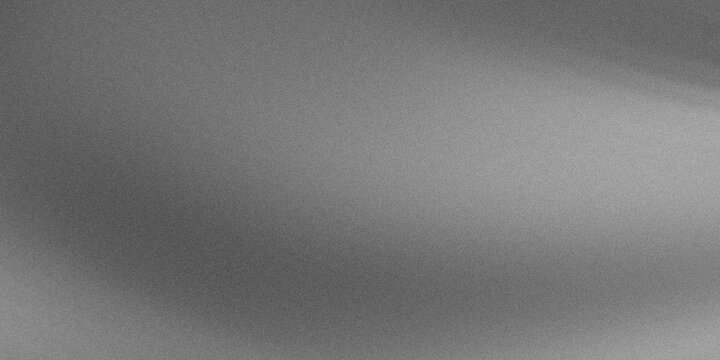 A grayscale image with a predominantly gray tone and subtle gradient effects