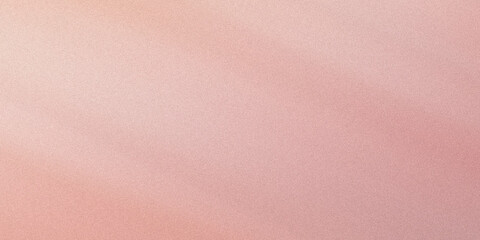 Fototapeta premium A soft pink and peach colored abstract background with a grainy texture