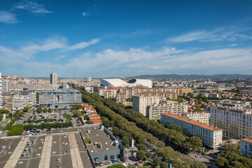 Fototapeta premium Aerial View of Marseille Cityscape with Orange Velodrome Stadium