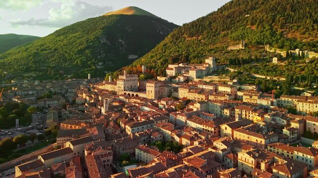 Aerial view of historic Gubbio town at sunset in Umbria, Italy