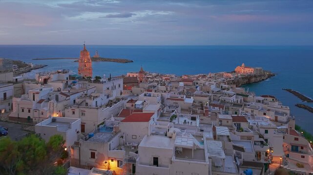 Aerial View of Vieste Medieval Town at Sunset in Puglia Italy