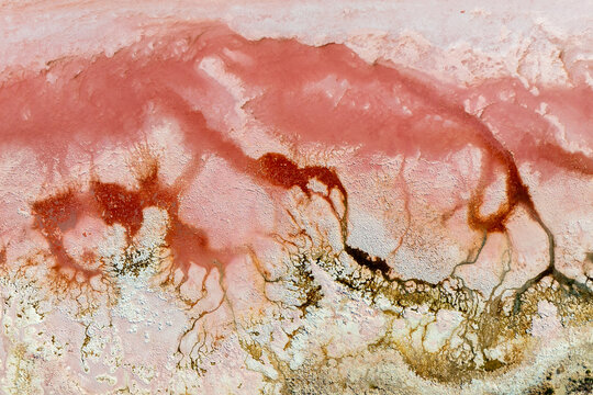 Aerial series of abstract pink salt crusts and mineral textures at Hutt Lagoon