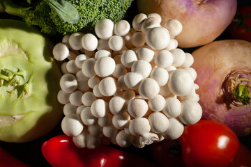 enoki mushroom vegetable mix on black background