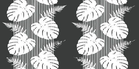 Seamless tropical pattern with white monstera leaves and fern silhouettes on a black background vector illustration © ZenVectors
