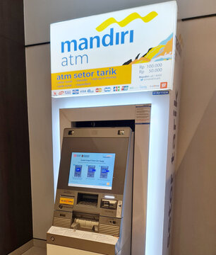 Bekasi, Indonesia on 13 Des 2025. Mandiri Atm Kiosk Inside Modern Bank Lobby