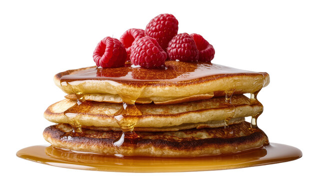 Isolated stack of fluffy pancakes with fresh red raspberries and golden maple syrup dripping
