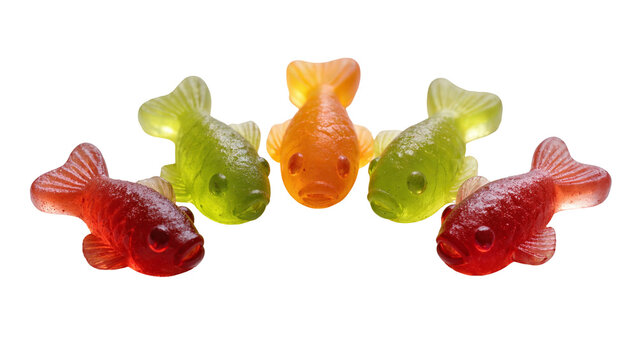 Isolated delicious colorful fruit-flavored gummy fish candies arranged as sweet treat