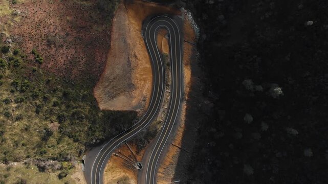 Aerial top-down view of winding mountain road near Yosemite, California