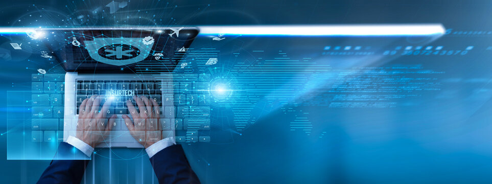 Analyst using laptop with insurtech platform on keyboard and analyzing digital insurance data, policy management, claims processing, risk assessment, and technology-driven insurance services.