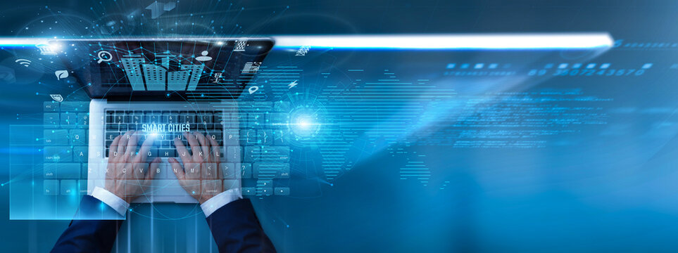 Urban planner using laptop with smart cities platform on keyboard and analyzing traffic data, energy management, public services, IoT systems, and sustainable urban development technology solutions.