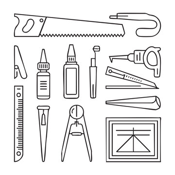 Set of black and white tools and supplies including rulers, compass, protractor, and pens