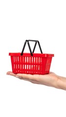 Fototapeta premium Red plastic shopping basket on a hand, isolated on white background