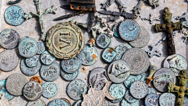 Collection of Ancient Currency and Christian Crosses