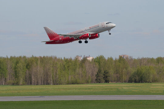 SAINT PETERSBURG, RUSSIA - MAY 20, 2022: Aircraft Sukhoi Superjet 100 (RA-89183) "Surgut" on take off. Pulkovo airport
