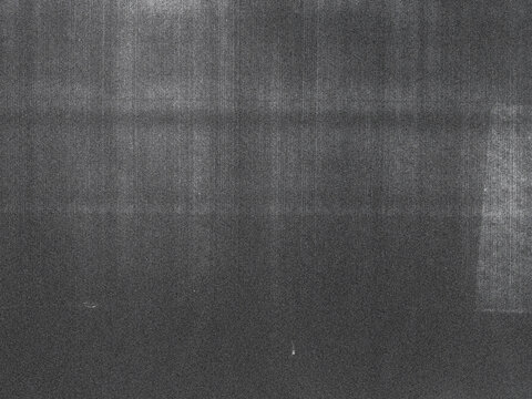 Photocopies of a black and white sheet of paper with a background or texture with grain and noise illustration