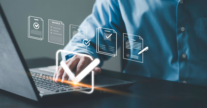 Audit, document verification, compliance review, and quality control process. Businessman using laptop check digital document with signature and checkmark icons.