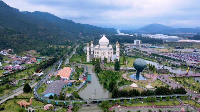 A stunning aerial view shows the ornate building at Jaime Duque Park surrounded by lush greenery and water bodies in Cundinamarca.