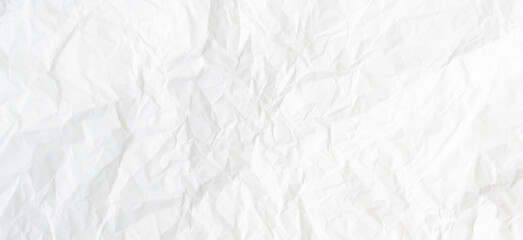 Top view and full frame of wrinkled or crumpled white paper texture used as crumpled white paper background texture in decorative art work © nathamag11