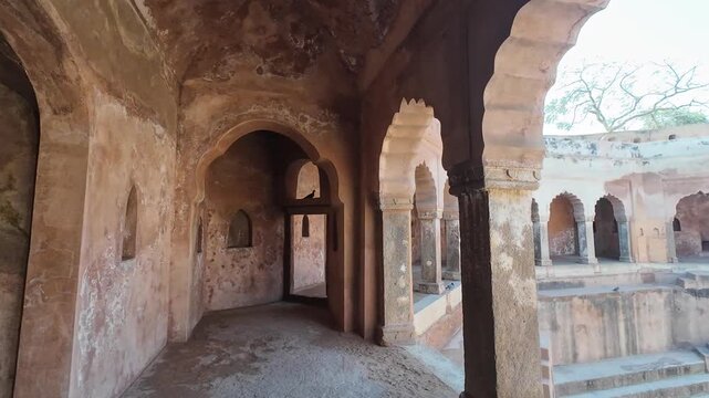 Symmetrical stone corridors and arched galleries inside the historic Gol Bawdi stepwell.
Capturing the magnificent architectural depth and ancient water conservation system of Farrukh Siyar's reign