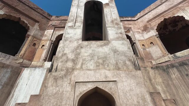 Symmetrical stone corridors and arched galleries inside the historic Gol Bawdi stepwell.
Capturing the magnificent architectural depth and ancient water conservation system of Farrukh Siyar's reign