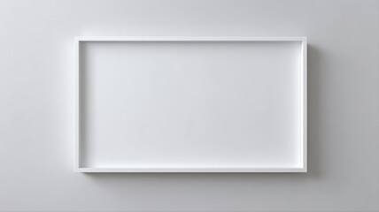 Obraz premium Minimalist White Frame Mockup on Wall for Art, Photography, or Advertisement Display
