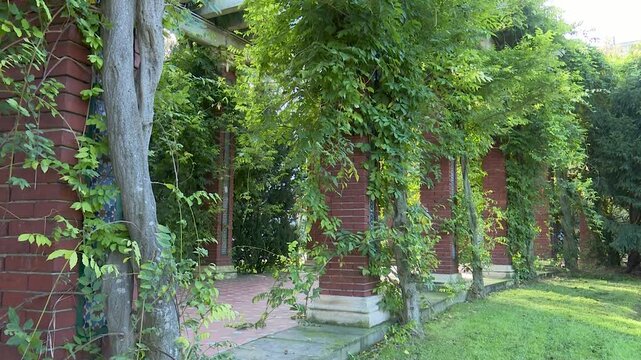 Urban park in Bilbao with gardens, fountains, trees, pergolas, and monuments. Green public space offering a peaceful environment where nature and city design meet.