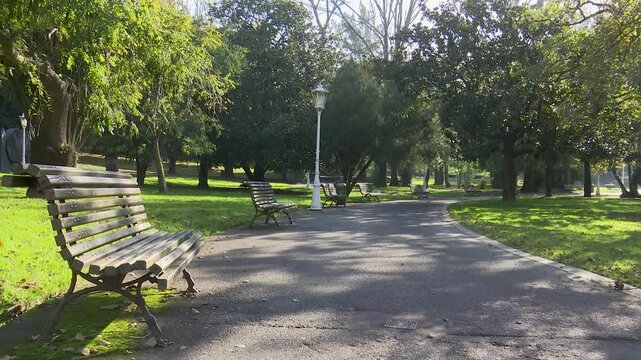 Urban park in Bilbao with gardens, fountains, trees, pergolas, and monuments. Green public space offering a peaceful environment where nature and city design meet.